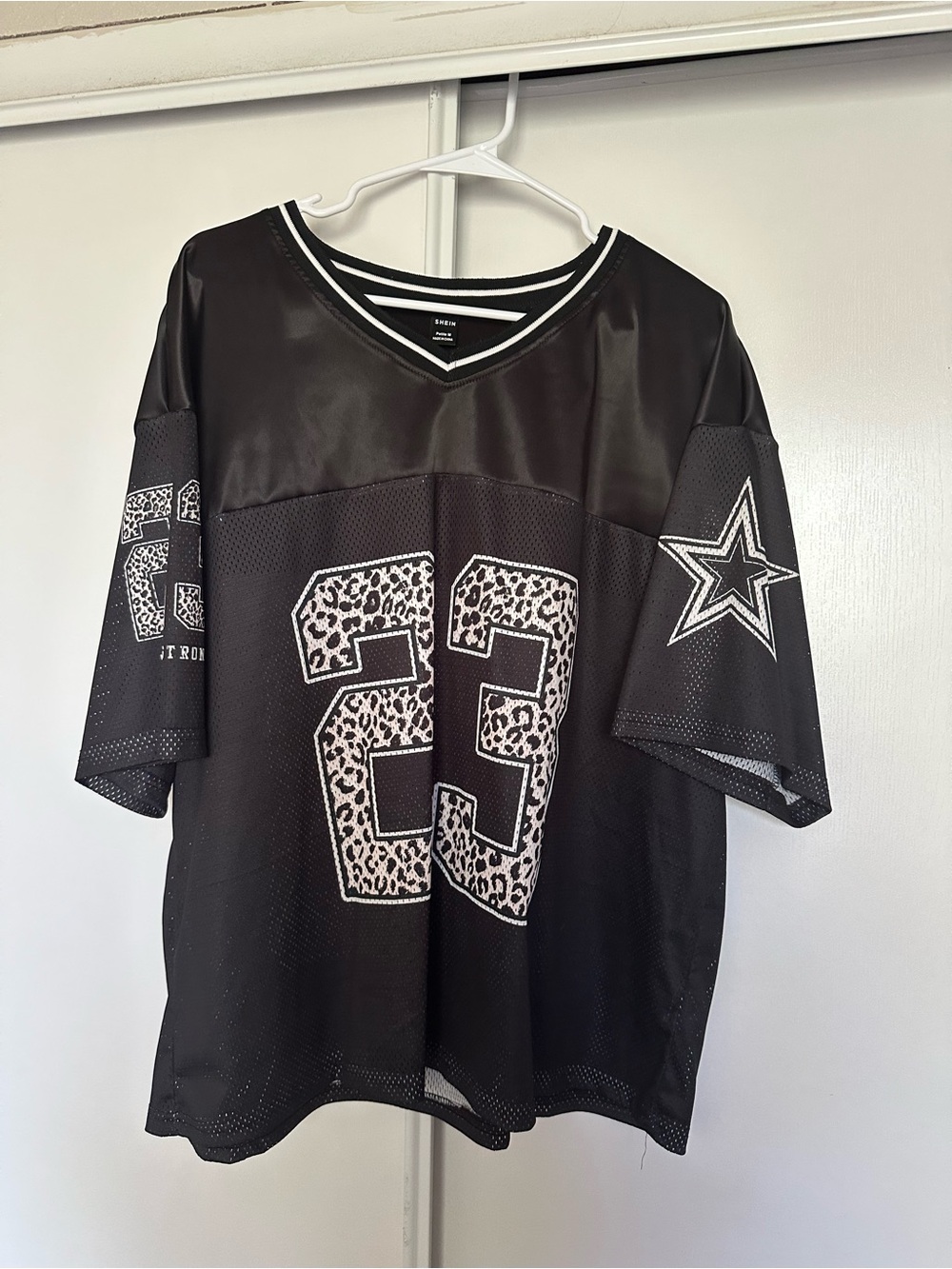 Mesh black and cheetah print jersey